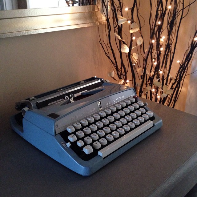 Simple home decor with vintage typewriter and twinkly white lights