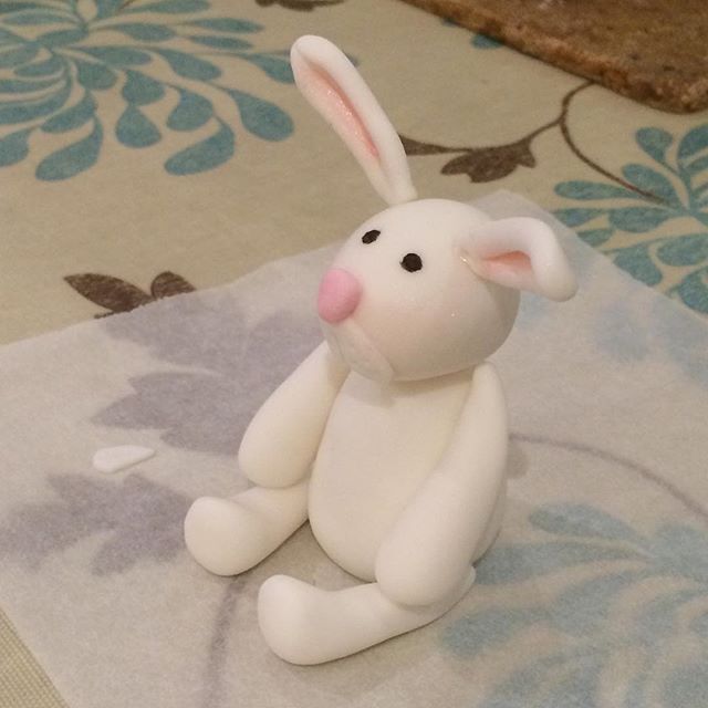 Watching my cake-decorating cousin create a bunny for the top of a birthday cake – so cute