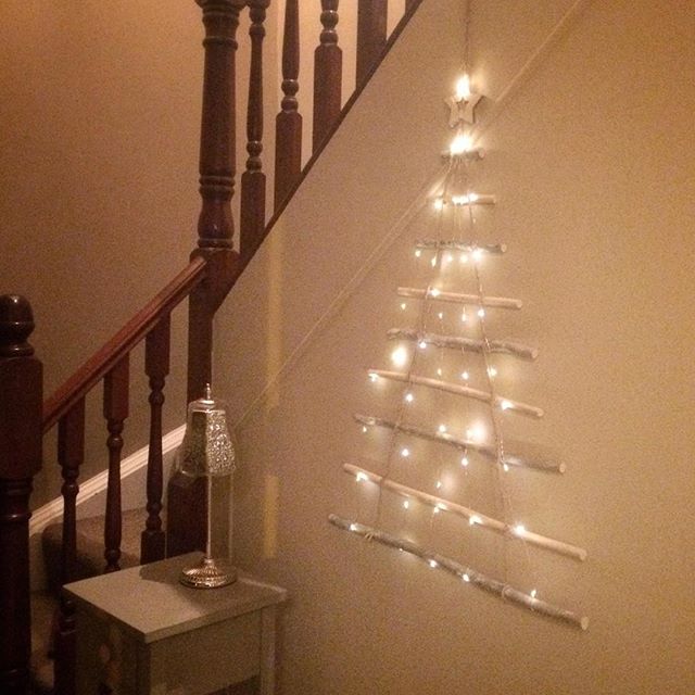 Loving my new John Lewis wooden ladder Christmas tree … especially with the added lights