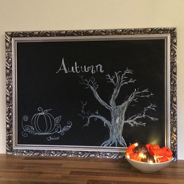 New huge chalkboard for doodling in our kitchen – tree by my son, pumpkin by me!