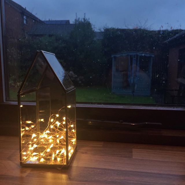 Warm white fairy lights on a cold damp afternoon