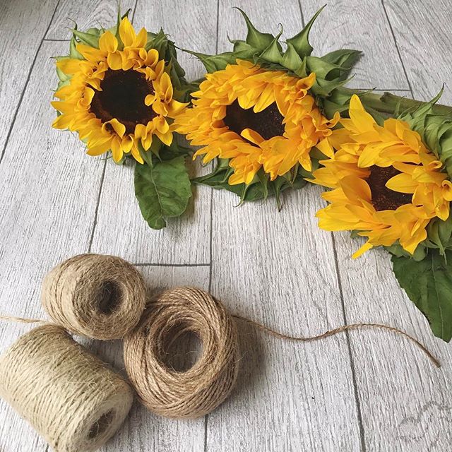 Sunflowers and string on a showery day!