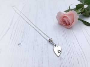 heart with small heart necklace